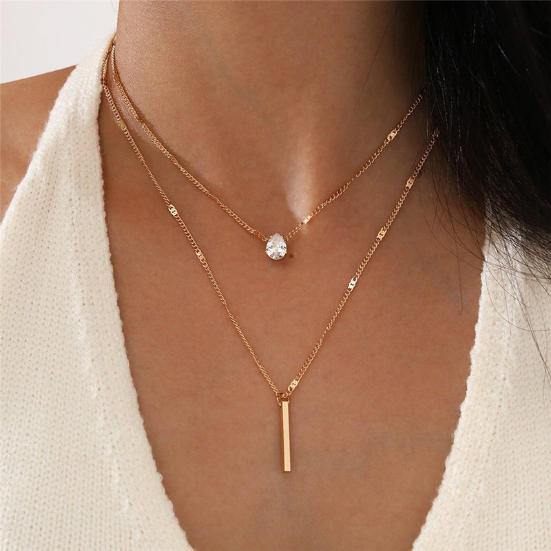 Set di collane vintage con pendente dorato