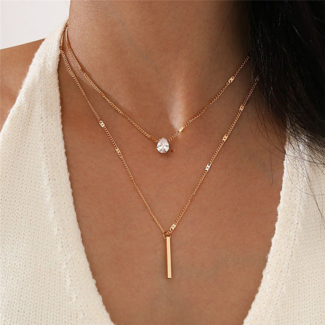 Set di collane vintage con pendente dorato