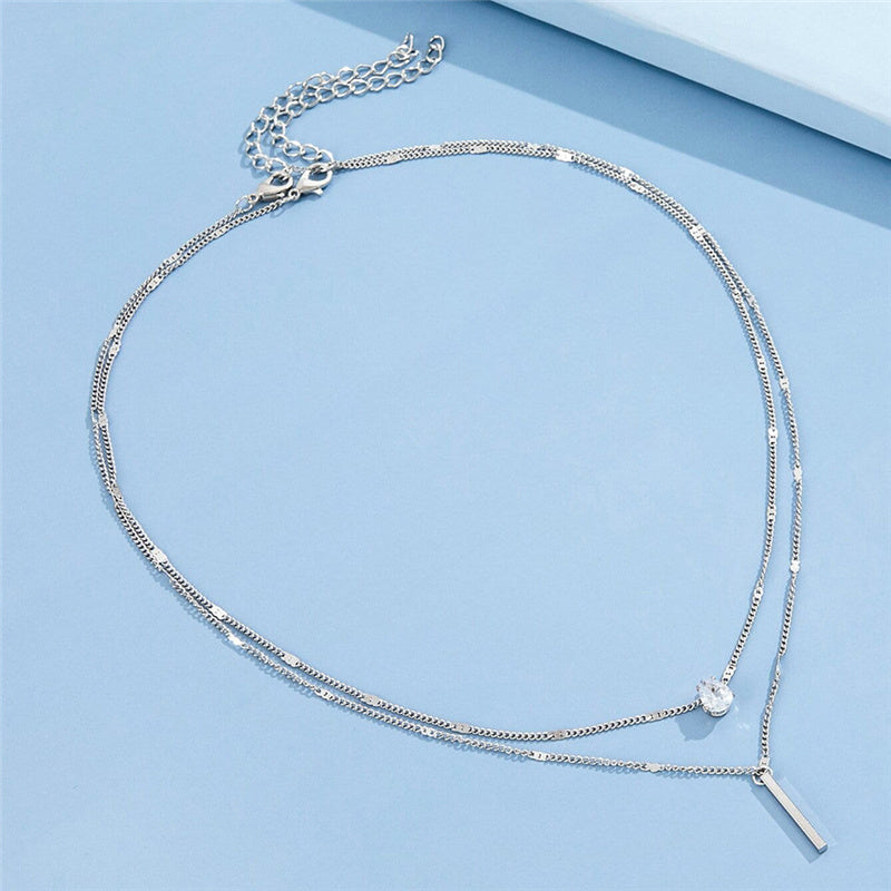 Set di collane vintage con pendente dorato