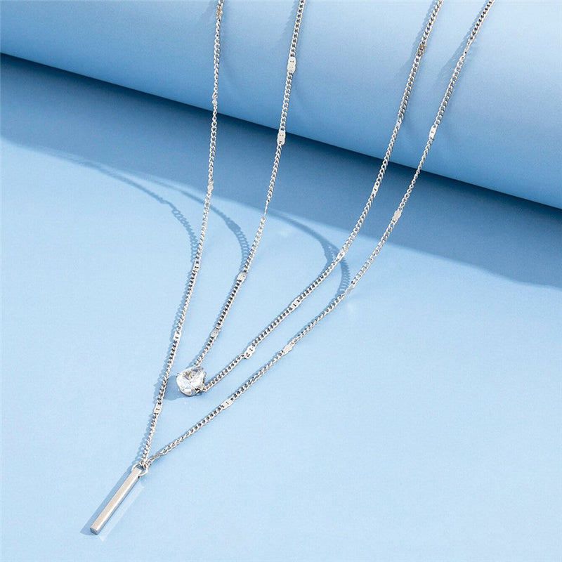 Set di collane vintage con pendente dorato