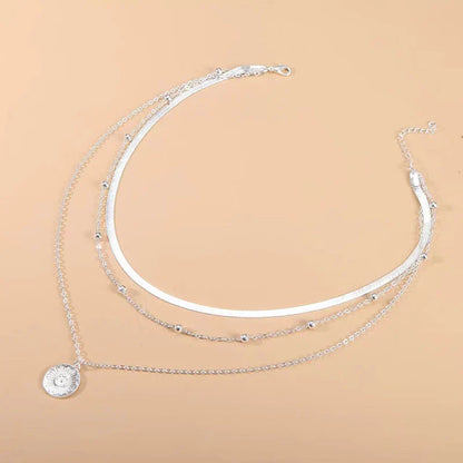 Collana Tripla