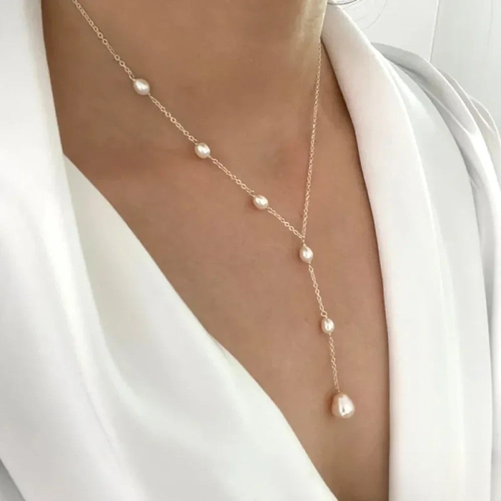 Collana vintage con pendente in perle