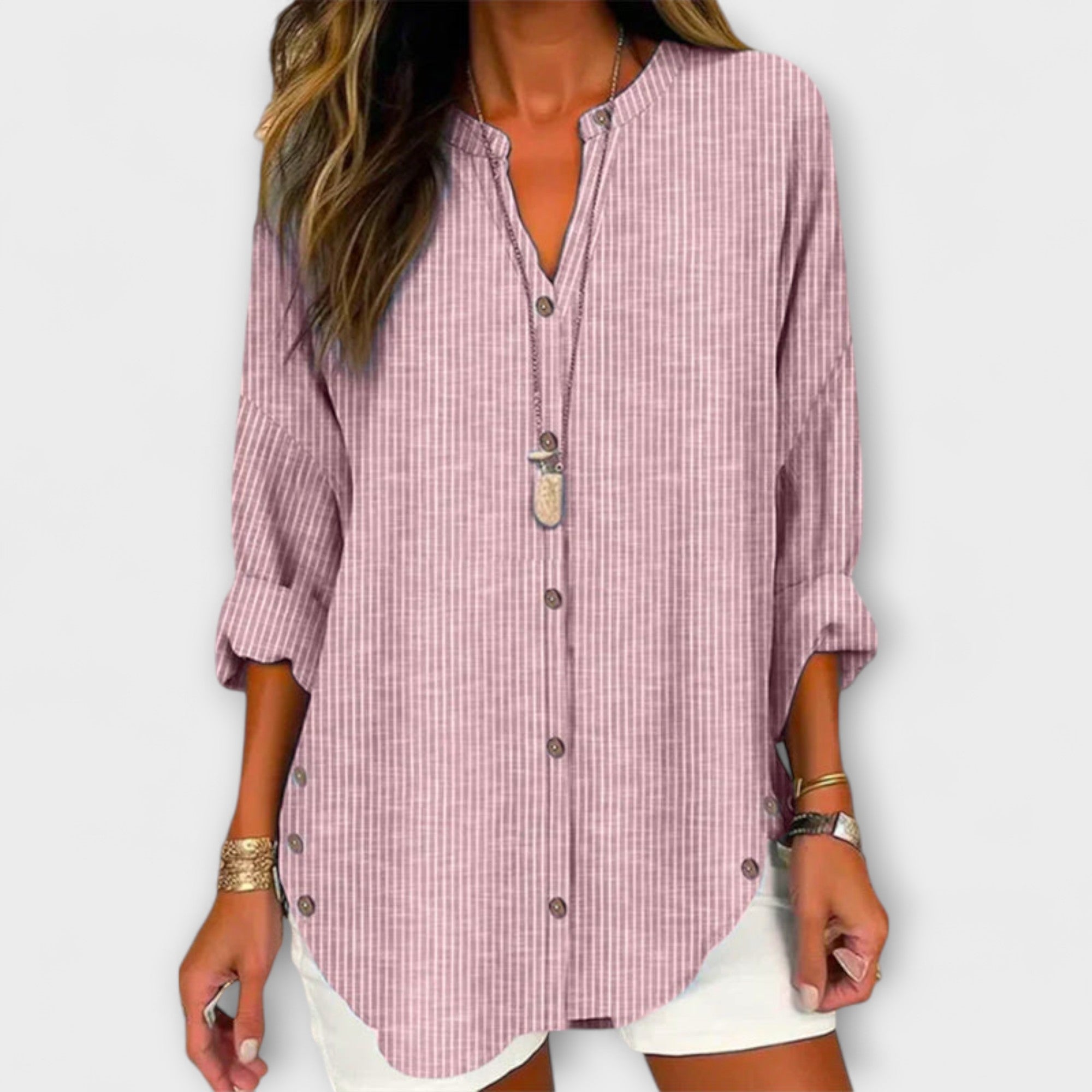 Lucida – Top elegante con scollatura a V e classico motivo a righe