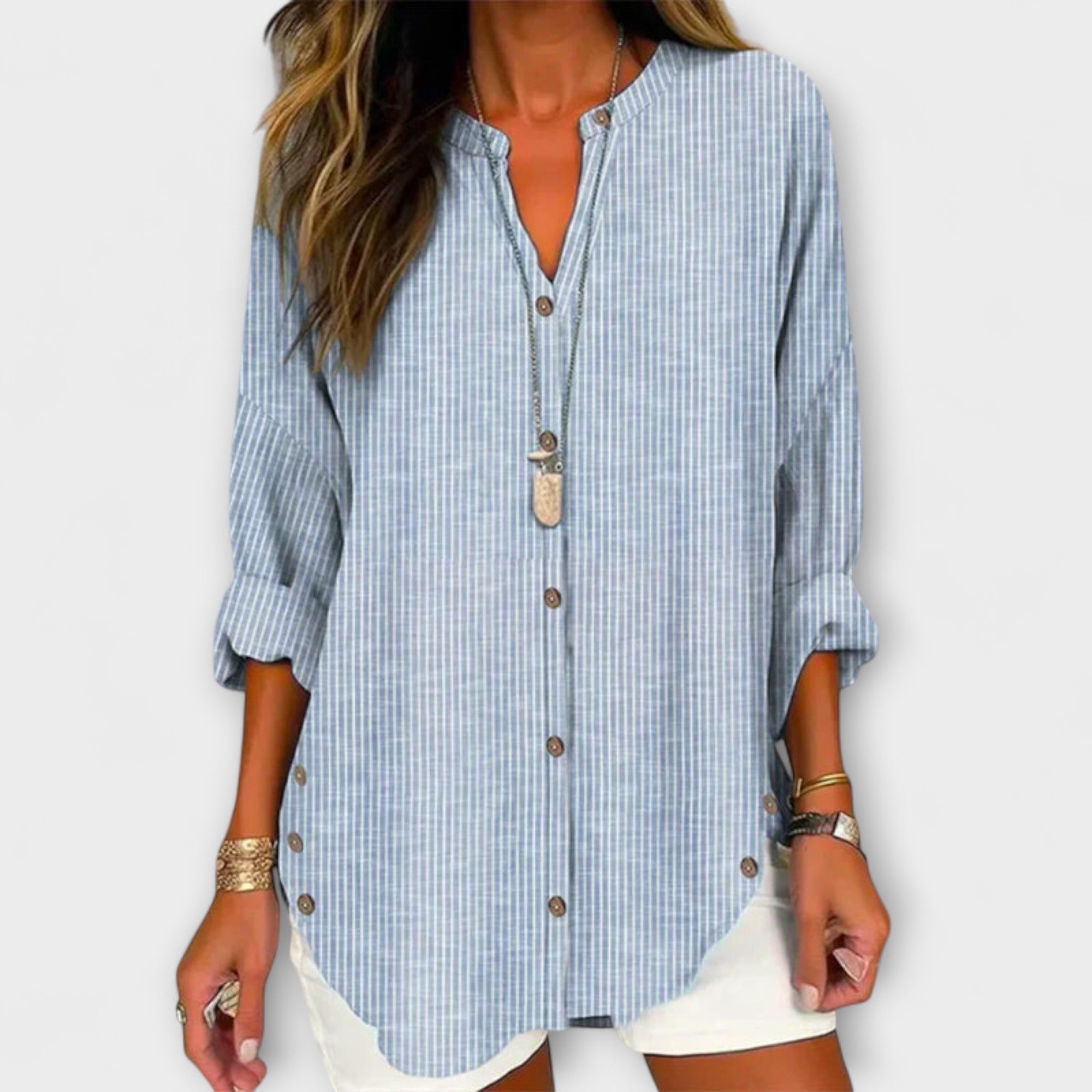 Lucida – Top elegante con scollatura a V e classico motivo a righe