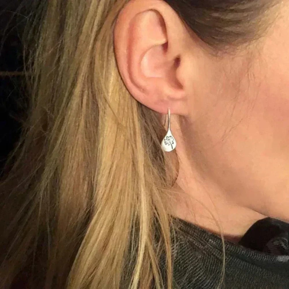Eleganti orecchini in argento design foglia di dente di leone