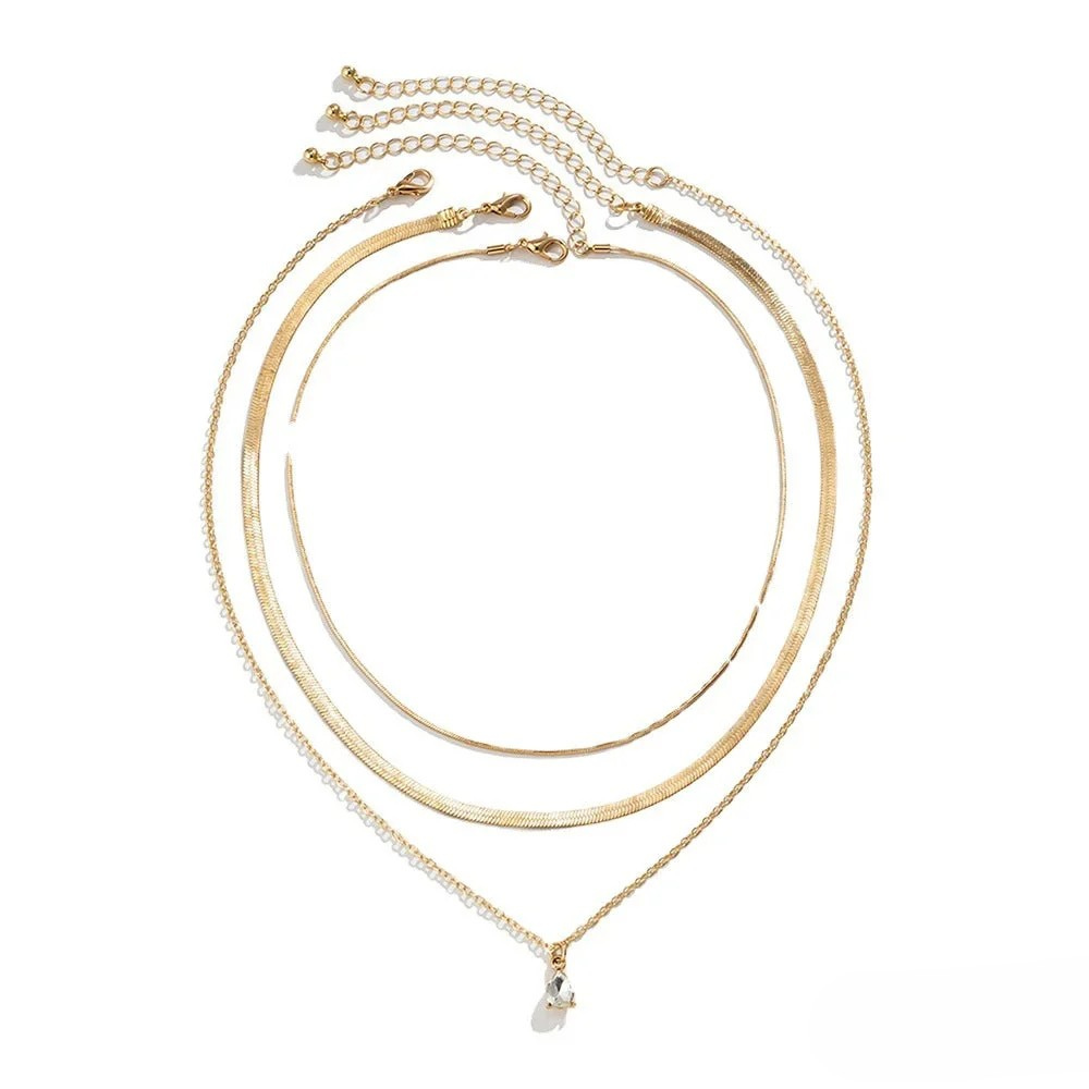 Collana a strati con pendente in zirconia color oro
