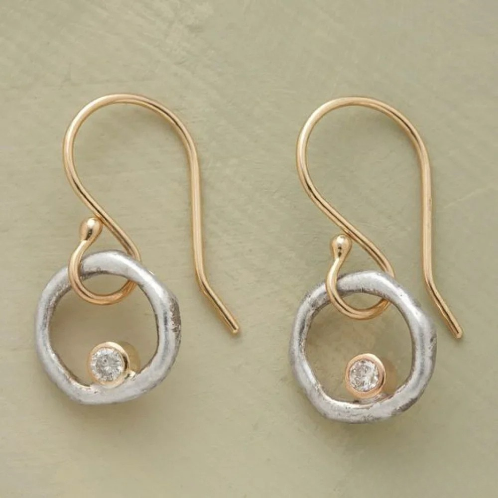 Orecchini a bottone in oro e argento con zirconia