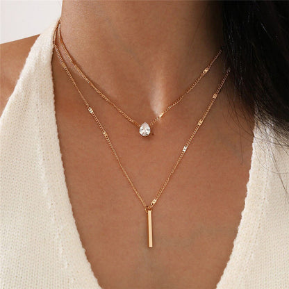 Set di collane vintage con pendente dorato