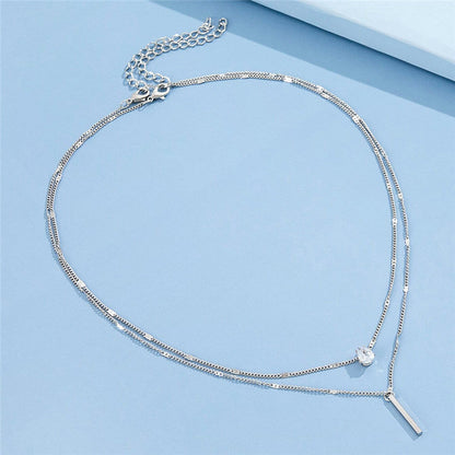 Set di collane vintage con pendente dorato