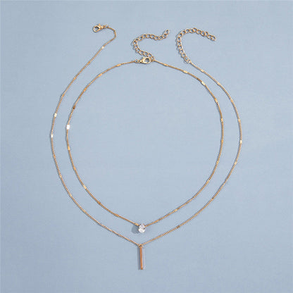 Set di collane vintage con pendente dorato