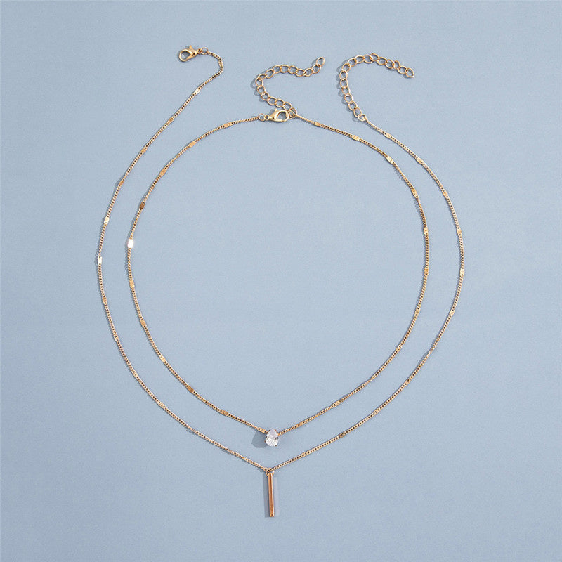 Set di collane vintage con pendente dorato