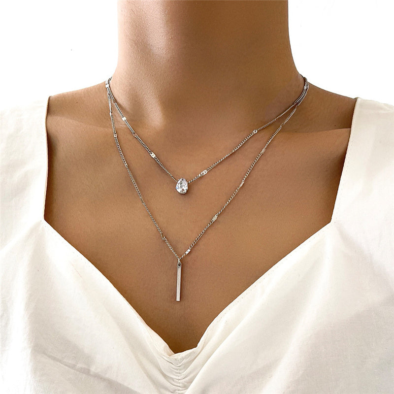 Set di collane vintage con pendente dorato