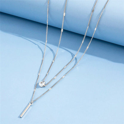 Set di collane vintage con pendente dorato