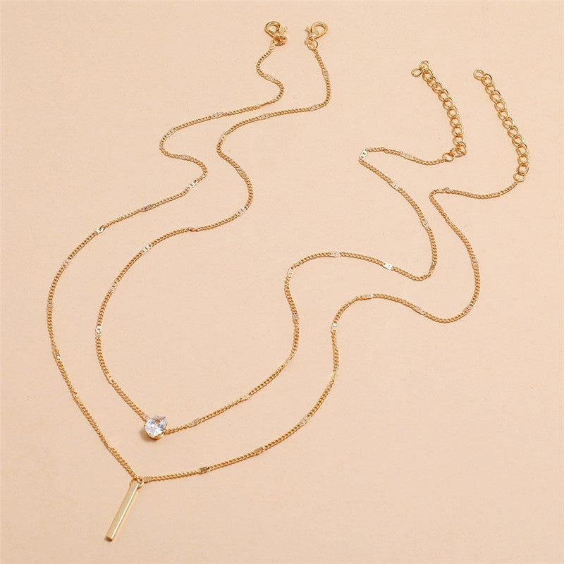 Set di collane vintage con pendente dorato