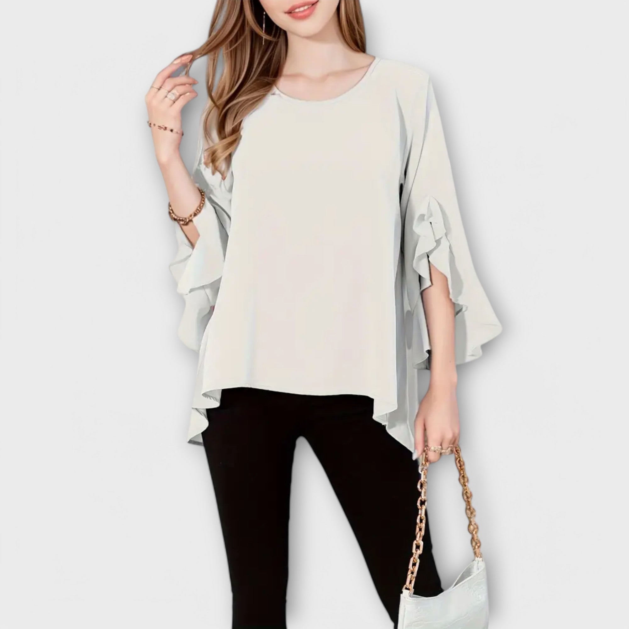 Aria - La perfetta blusa primaverile con scollo rotondo
