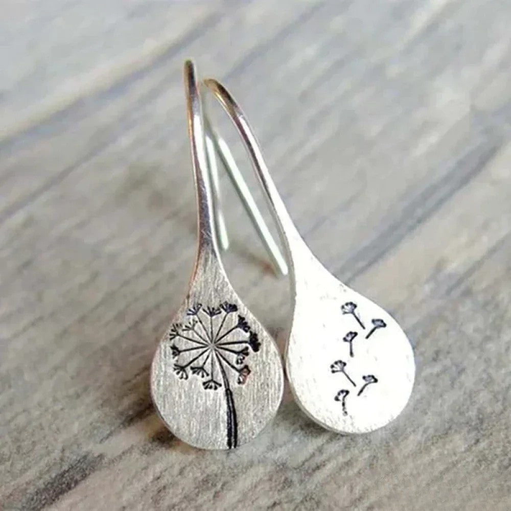 Eleganti orecchini in argento design foglia di dente di leone